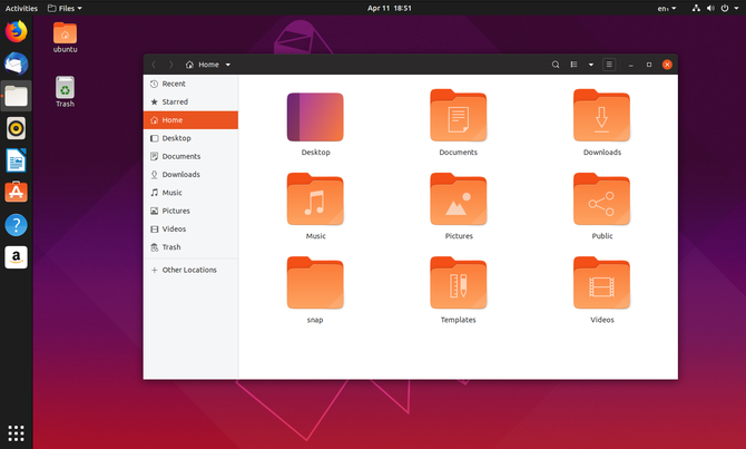 Manager de fișiere Ubuntu 19.04 cu pictograme desktop pe fundal